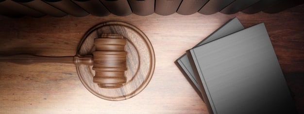 A gavel resting on a stack of legal documents related to media law.