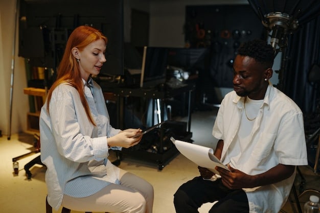 An independent musician signing a sync licensing agreement with a representative from a film production company in a modern office setting.