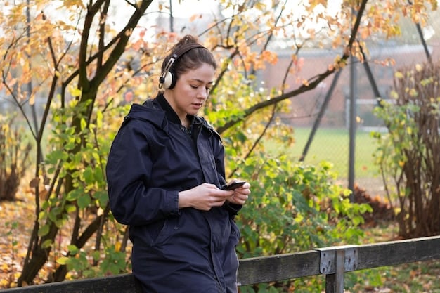 A person wearing headphones and smiling while jogging in a park, listening to a podcast on their smartphone. The focus is on the earbuds and smartphone screen displaying a podcast app.