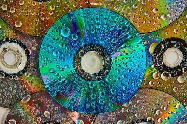 A close-up of a vinyl album cover with intricate and colorful artwork. The cover is displayed prominently, highlighting the visual appeal of the large-format design.