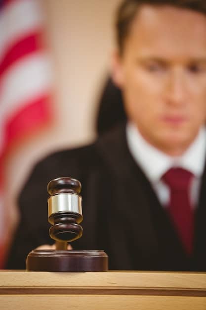 A judge's gavel striking a sound block, symbolizing legal proceedings and court decisions related to challenges to the Voting Rights Act.