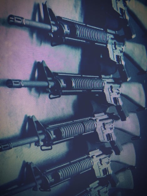 A collage showing different types of firearms, including AR-15 rifles, pistols, and shotguns, alongside data visualizations comparing crime rates in states with and without assault weapon bans.