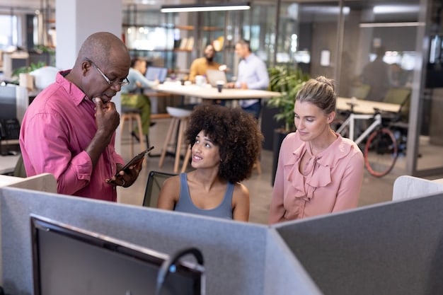 A diverse group of employees collaborating in a modern office space, symbolizing a company's operational readiness for expansion.