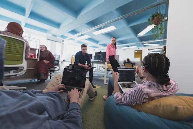 A modern open-plan office space in Silicon Valley, filled with diverse teams collaborating on digital projects, visually representing the integration of technology into everyday business operations.