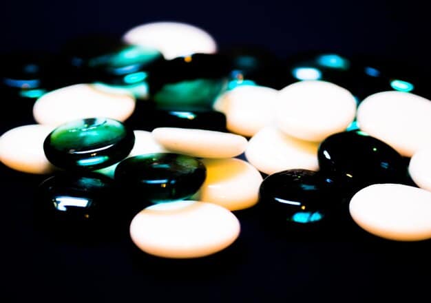 A close-up of prescription pills scattered on a reflective surface, with a blurred image of a dollar sign in the background, symbolizing the high cost of pharmaceuticals and potential price manipulation.